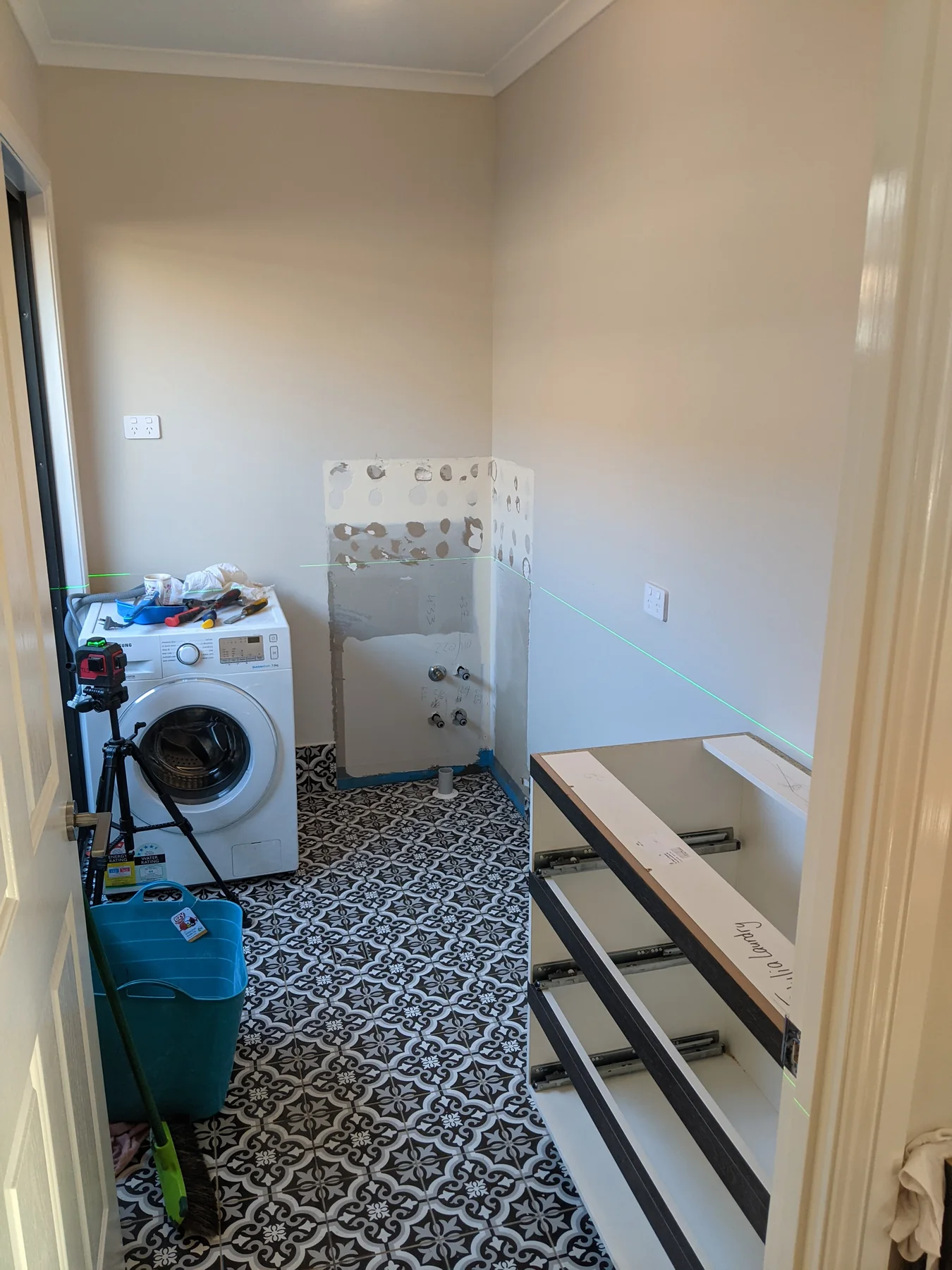 The original laundry before the new cabinetry was installed